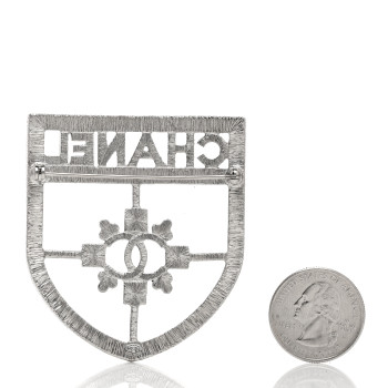 CHANEL Swarovski Baguette Crystal CC Shield Brooch CHANEL Swarovski Baguette Crystal CC Shield Brooch